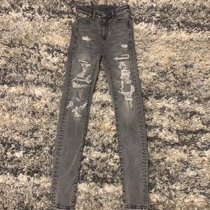 grey ripped American eagle jeans